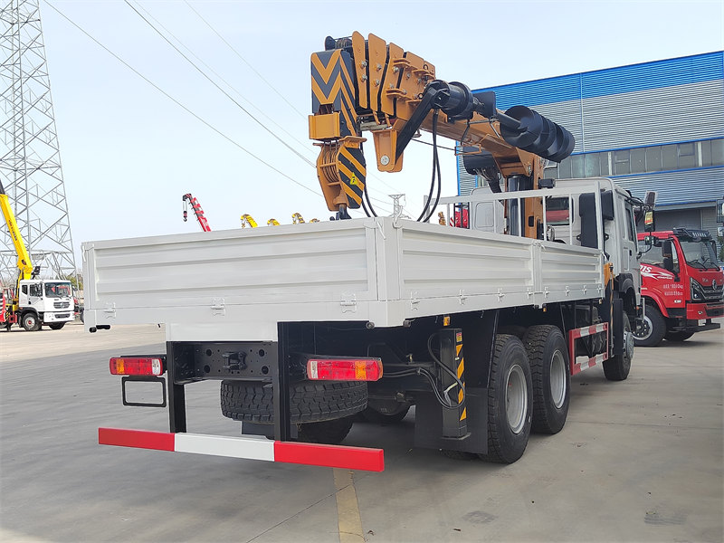 HOWO 6&times;6 boom crane truck with drilling bit